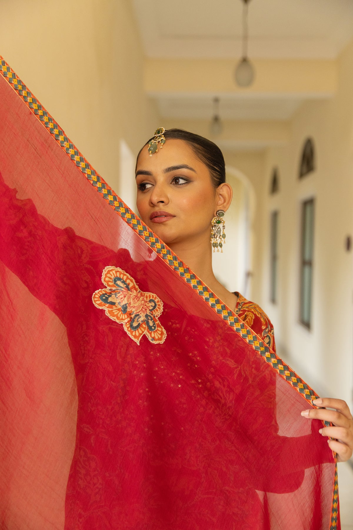 Festive Suit Set in Red Printed Muslin with Chanderi Patch Dupatta